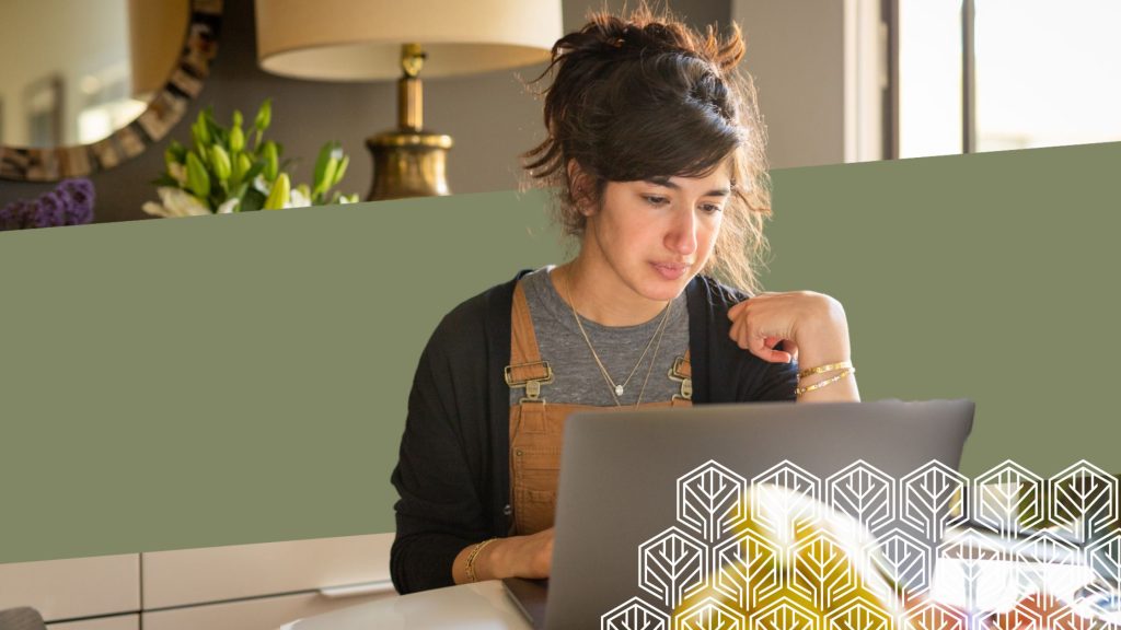 an image of a woman using her laptop